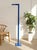 A striking vintage Italian floor lamp with a slim, architectural silhouette and saturated blue painted finish. The tall...