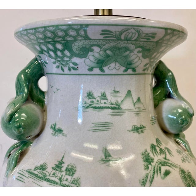 Handled Porcelain Jar Vase Table Lamp on Wooden Base Decorated in a Soothing Green Asian Landscape Scene With White Lampshade For Sale - Image 9 of 13