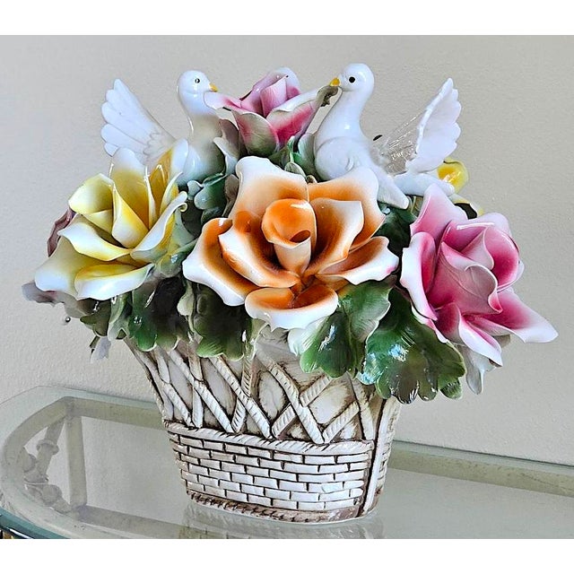 A striking vintage Nuova Capodimonte porcelain centerpiece, handcrafted in Italy during the 1970s. This large-scale...