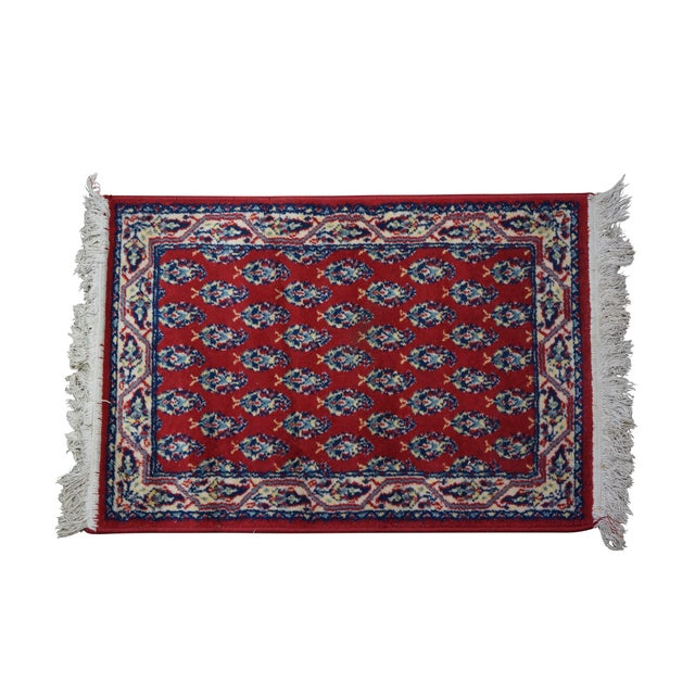 Vintage Belgian 100 virgin worsted wool rug runner featuring a repeating floral paisley Mekka design in red, yellow,...