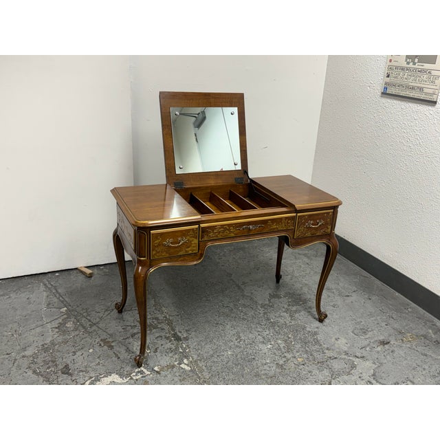 Design Plus Gallery presents a 1980s Vanity Desk by Phyllis Andrade for White Furniture Company. This French Provincial...