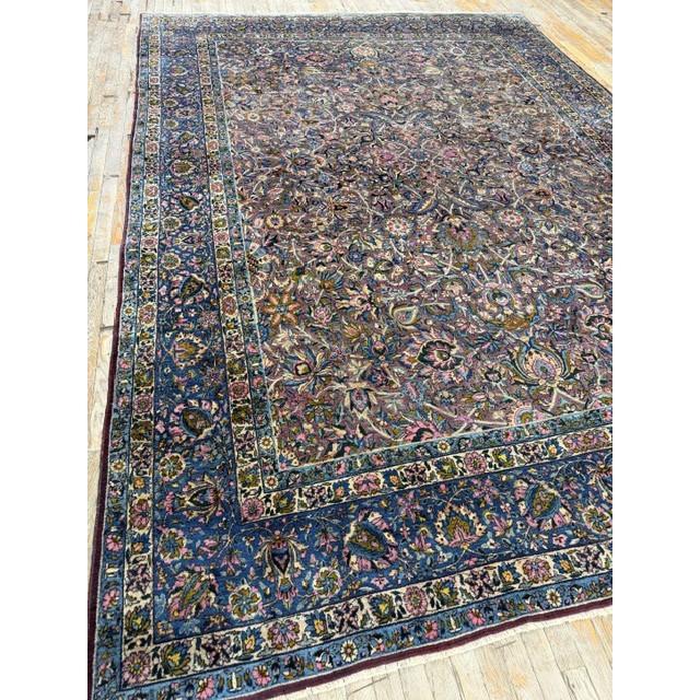 this mid-19th-century Persian textile masterpiece beautifully represents the prestigious weaving artistry of Kerman,...