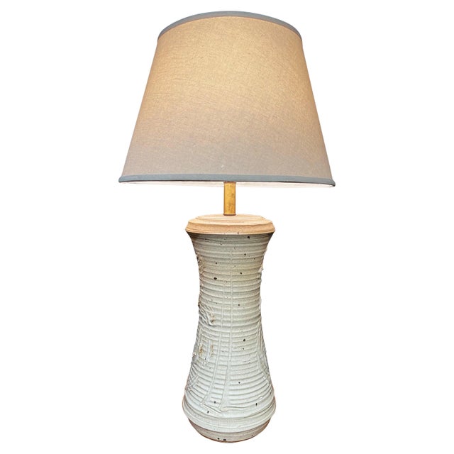 A captivating Ceramic Table Lamp, exquisitely designed by the talented artist Bob Kinzie for Affiliated Craftsmen. This...