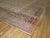 Large antique shabby chic Khotan rug with an all-over Pomegranate Design with faded red and brown hues on a gray ground...