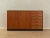 Wonderful chest of drawers from the 1960s in scandinavian design in teak veneer. A body with two cabinet doors, two...