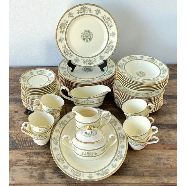 This sophisticated 63-piece dinnerware service by the legendary English maker Minton features the celebrated "Henley"...