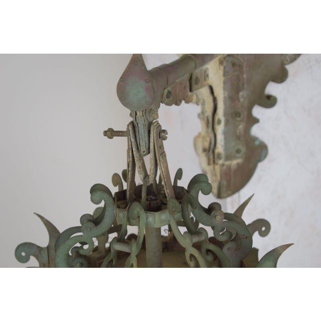 An impressive pair of Italian corner lanterns dating back to the 1920s, characterized by a charmingly eclectic style with...