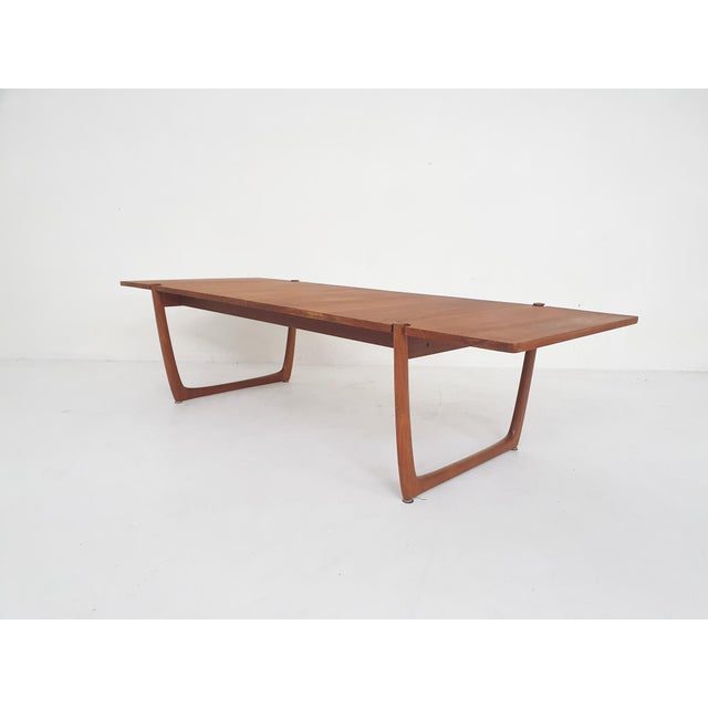 Large coffee table 175cm(!) in teak veneer by Peter Hvidt and Orla Molgaard Nielsen for France and Son. Marked with a tag...