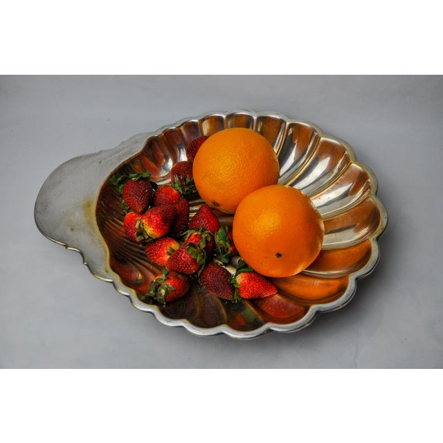 Superb and large empty shell pocket designated in Spain in the 1970s. Structure in silver-plated brass representing a...