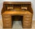 Late 19th Century Exceptional Arts & Crafts or quarter-sawn oak executive roll top desk with raised beveled side panels...