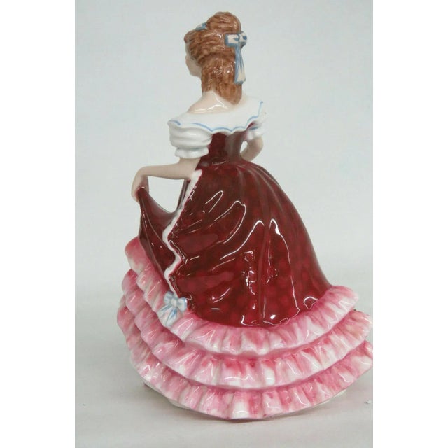 This charming Figurine is made of bone china / porcelain. This beautiful figurine is stamped as having been made in...