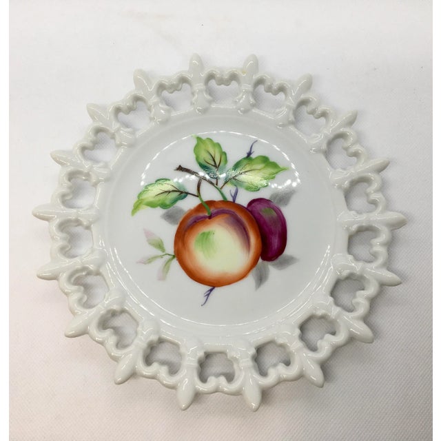 A pair of vintage porcelain Lefton China plates. Beautifully hand painted fruit, buds and leaves on a pristine white plate...