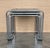 Set of three nesting tables with cantilever chrome tubular frames and smoked glass tops. Ca. 1970s.