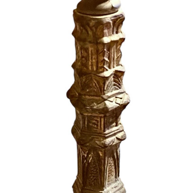 A period American Art Deco patinated spelter candlestick lamp with classic Art Deco swag, ziggurat and deco arch designs....