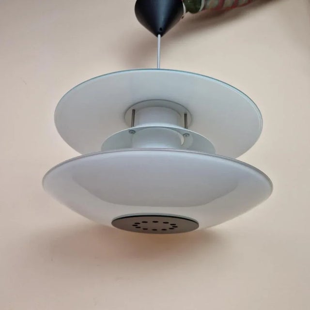 Danish Glass Pendant Lamp from Halo Tech Design, 1990s, in Flawless conditions. Designed 1990 to 1999 This piece has an...