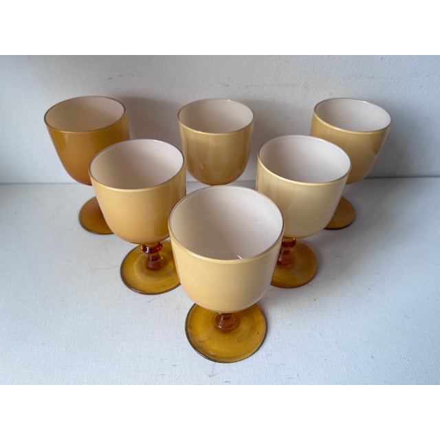 This lovely set of 6 hand-blown cased glass goblets were made in Italy by Carlo Moretti in the Butterscotch & White...