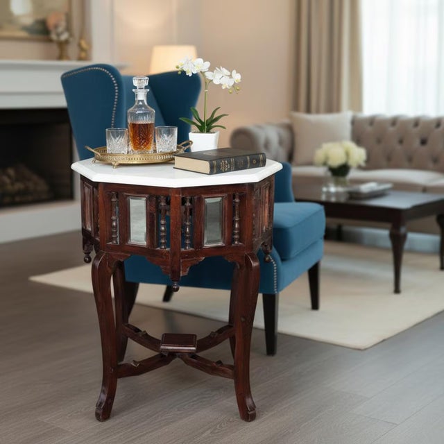 Anchor your home with a genuine piece of history and opulent Victorian decor. This stunning Vintage Marble Top End Table...