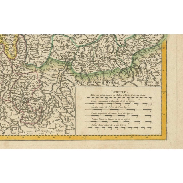 This detailed 18th-century map by Gilles Robert de Vaugondy presents the Swiss Confederation, including its 13 cantons,...