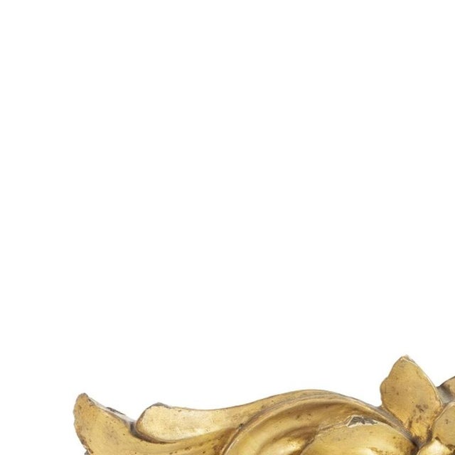 Sacred Art - Carved element - 19th century. Portuguese; 19th century carved and gilded wood; representing a flower....