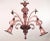 This authentic Murano chandelier elegantly models the thousand-year-old glassmaking tradition of Murano, an island set in...