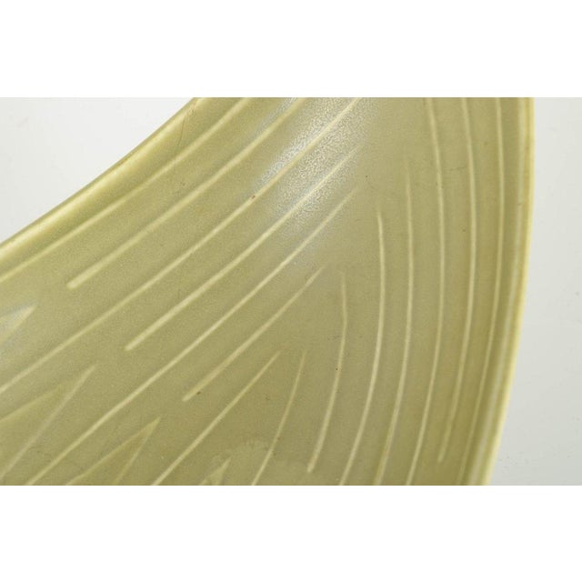 Rörstrand “Rialto” Large decorative bowl, 1960s. Organically shaped stoneware bowl with incised interior pattern and...