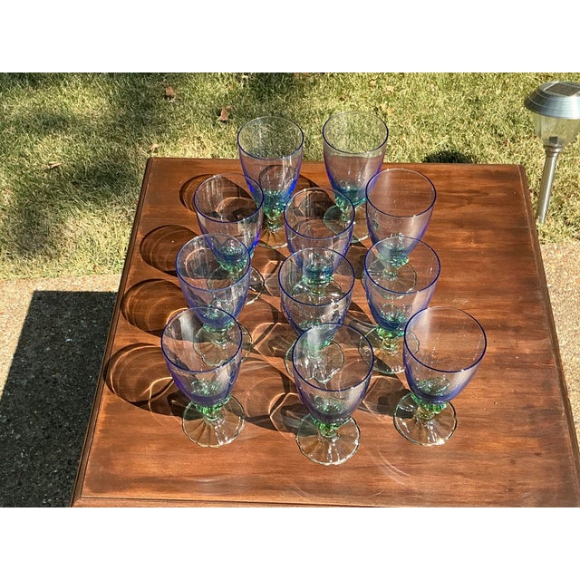 This beautiful hand-blown crystal stemware set of eleven glasses was made by Bormioli Rocco in Italy and is now...