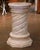 This substantial antique pedestal combines classical architectural form with bold sculptural decoration. Crafted in France...