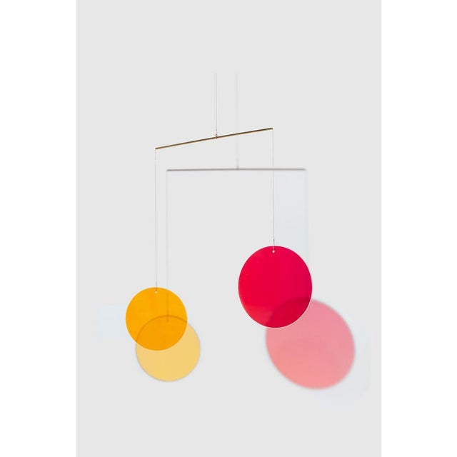 made of 2 brass sticks and 3 round dichroic glasses colours vary- please contact me for special glass selection Camilla...