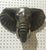 Pair of Mid-Century bronze elephant heads. Verde and gold patina. Incredible details. Slight color variation between the...