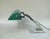An exceptional banker's lamp from the Art Deco period, crafted in the characteristically austere style of the era. The...