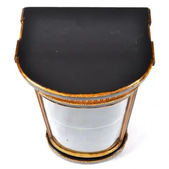 A small ebony and gilded early19th century Gustavian period Console / Display cabinet with glass D- shaped door and fitted...