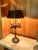 A striking pair of Frederick Cooper bouillotte table lamps, crafted in the mid-20th century. These lamps embody timeless...