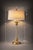 Elevate your space with this refined and sculptural table lamp, thoughtfully designed to balance classic decorative motifs...