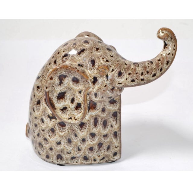 Beautiful Mid-Century Modern Artistic Brown Beige Textured ceramic Elephant sculpture figurine in excellent condition....
