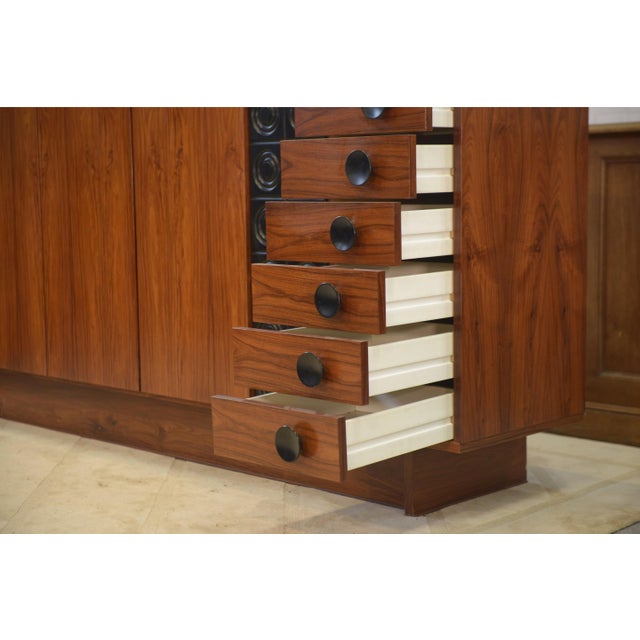 Brutalist sideboard by De Coene, Belgium – 1970s. A superb bar cabinet with a brutalist design, recognizable by its...
