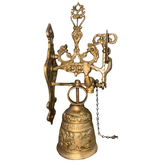 Vintage cast-brass Gothic Revival monastery bell. The winged figure, dragon/serpent ornament, horizontal pull mechanism,...