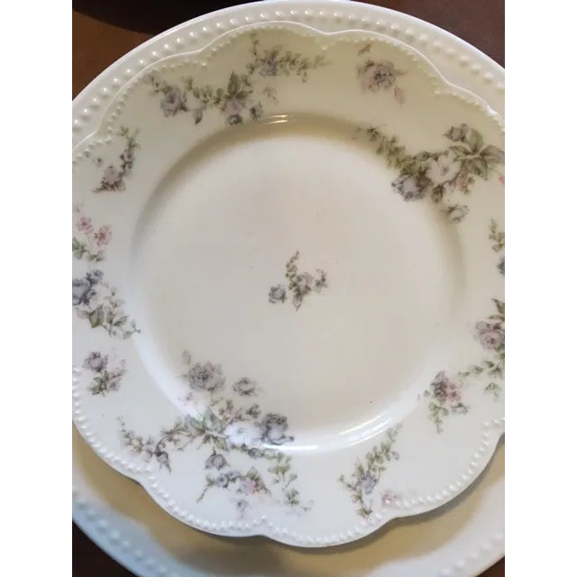 Here's a pretty mismatched place setting for 2 consisting of 2 antique Haviland Limoges floral china desserts/salads on...