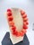 Signed (c) Kenneth Lane faux‑coral statement necklace featuring large polished resin beads in a vivid coral‑orange hue....