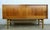 Slick, versatile and beautiful Danish modern mid century teak credenza / buffet / bar cabinet with compact foot print. LOW...
