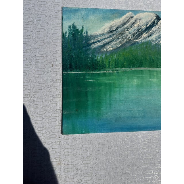 Up for consideration is a beautiful vintage mountain and lakeside painting on canvas. This would look lovely in your home,...