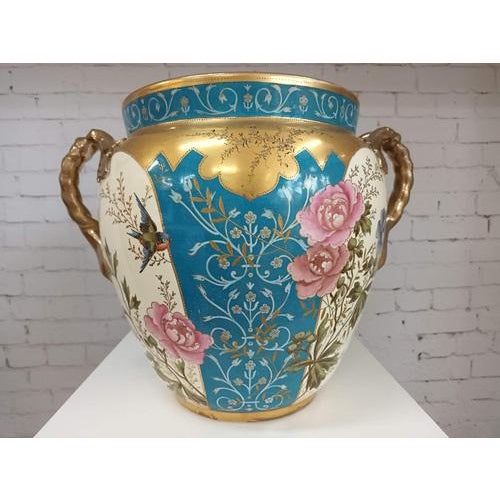 This exceptionally extra large royal bonn vase, crafted by franz anton mehlem, dates from approximately 1875 to 1890,...