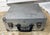 High quality example of mid century camera suitcase. Measures 14 x 14 x 5.5”. Lined in deep red velvet.There aere issues...