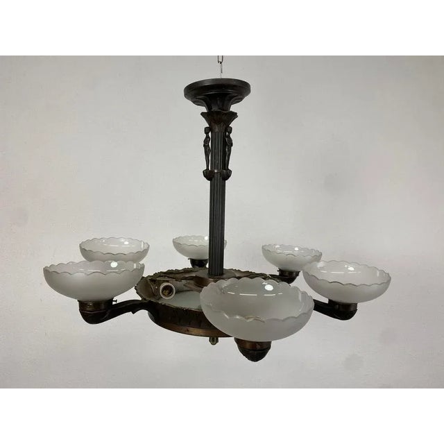 Secession bronze chandelier with figural motif. Up to 250V (Europe/UK Standard).The wiring of this item may be original...