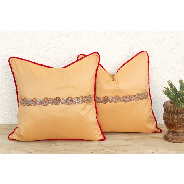 Crafted in India from a lustrous silk-blend textile, this pillow cover is embellished by hand with traditional Zardozi-...