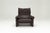 A 'Maralunga' Armchair in brown leather upholstery, designed by Vico Magistretti for Cassina in the 1970's. ​It has an...