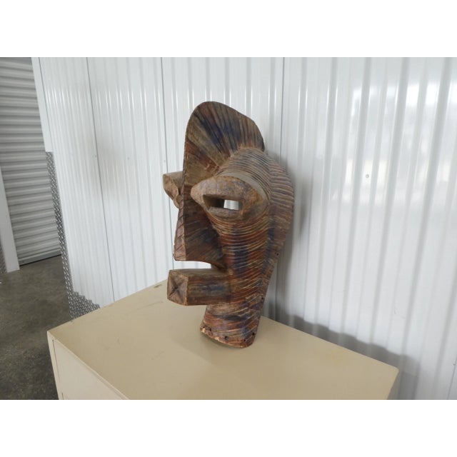 Mid Century African Songye Hand Carved Wooden Tribal Mask sold as found in good Condition showing only minor signs of wear.