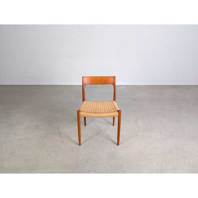 We are offering a beautiful teak chair by niels o. Møller, model 77, for sale. This chair features the sought-after paper...