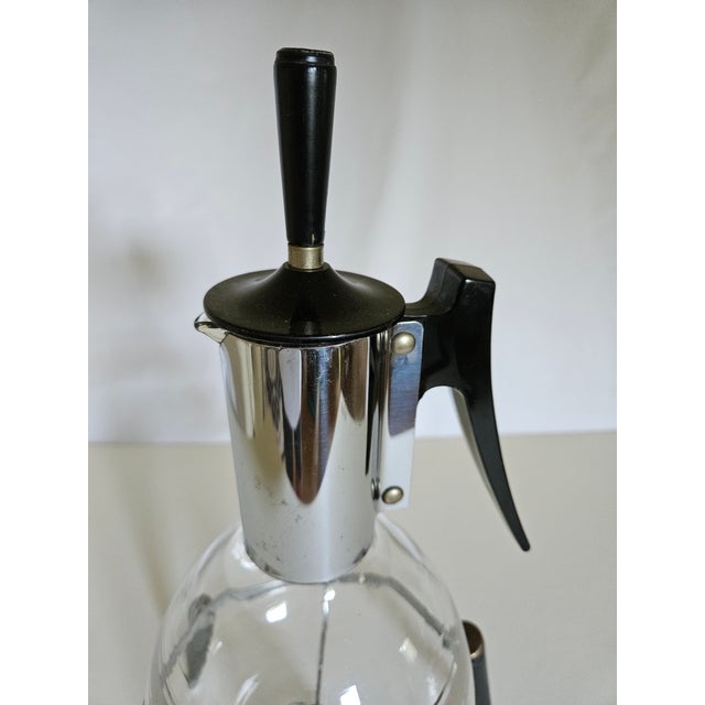 A great Mid Century Modern Atomic Tripod coffee server with tripod heating stand in very good condition, no damage, can be...