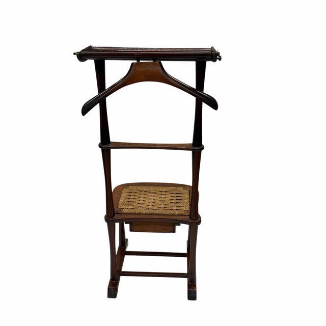 Vintage mid century modern men’s mahogany valet chair with drawer. Marked SPQR, Italy. Measures 16” w x 19” d x 43” h. Has...