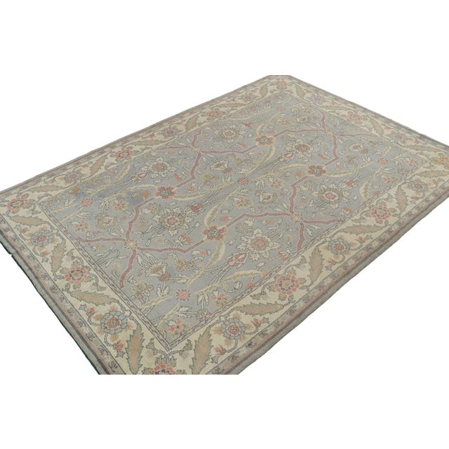 This antique 9x13 Arts & Crafts rug is a rare new Irish Donegal rug in Rug & Kilim’s classic curations. Hand-knotted in...